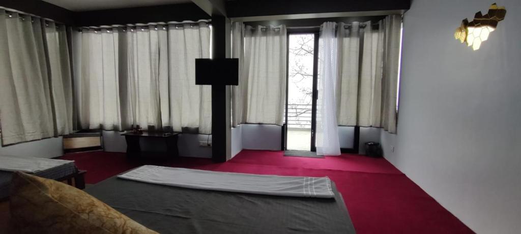 Postel nebo postele na pokoji v ubytování Mountain Chalet