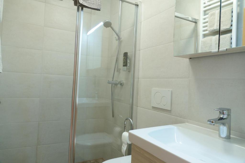 Koupelna v ubytování Hotel Malteinerhof