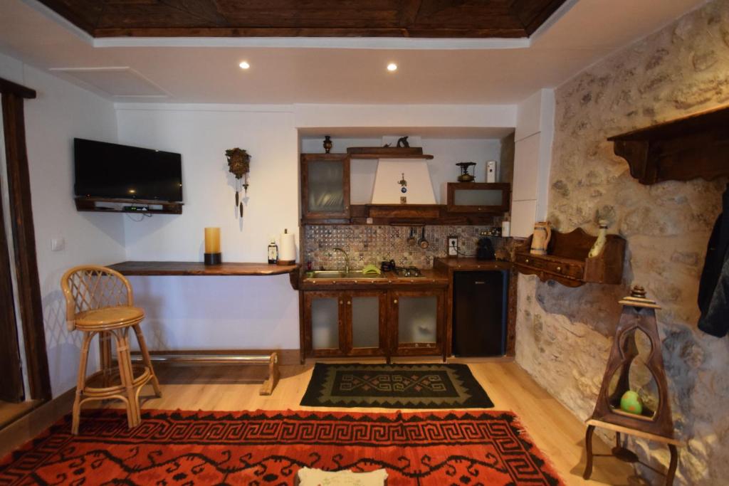 Kuchyň nebo kuchyňský kout v ubytování Irini's studios