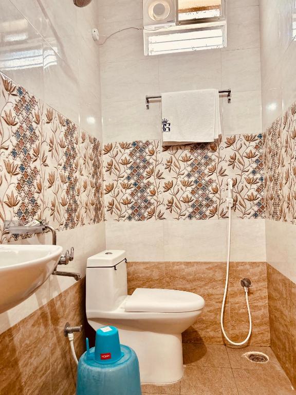 Koupelna v ubytování Hotel Sitar Grand
