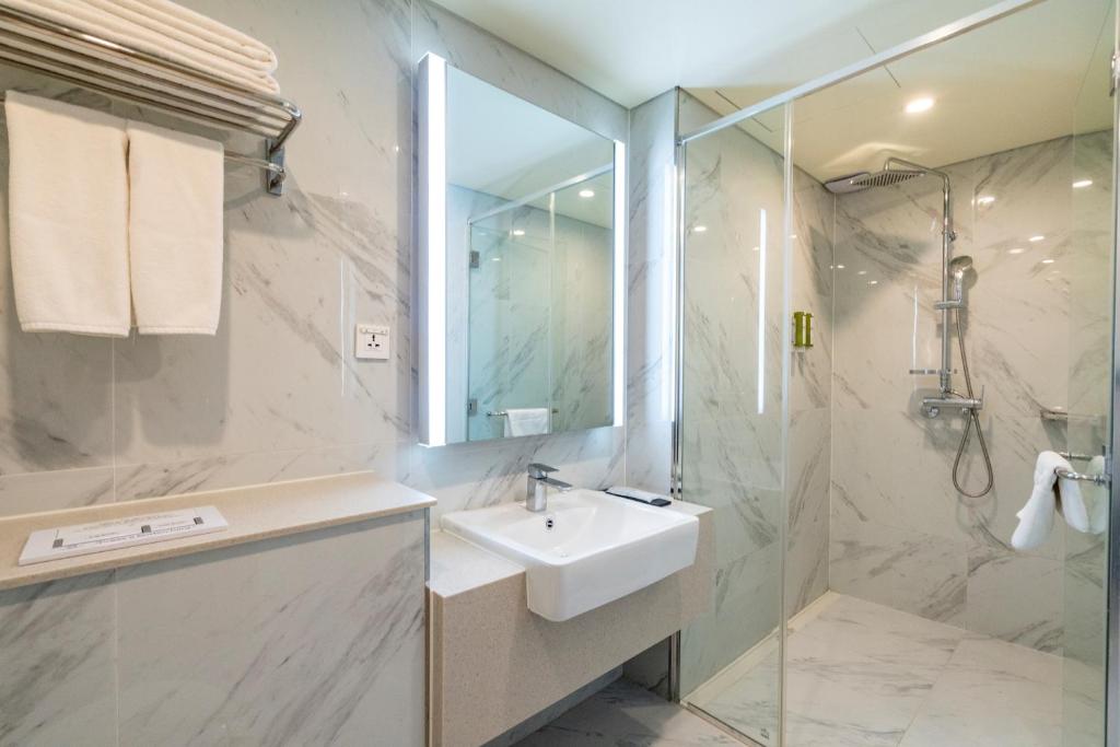 Koupelna v ubytování Centum Business Hotel