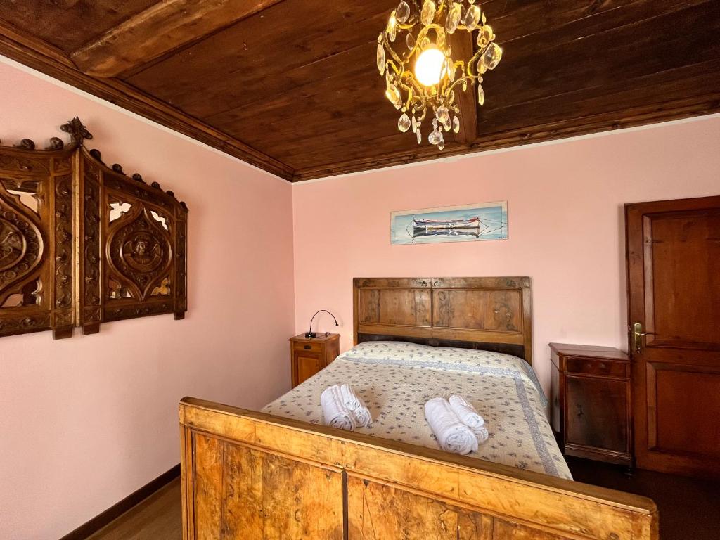 Postel nebo postele na pokoji v ubytování Ca' De Franceschi