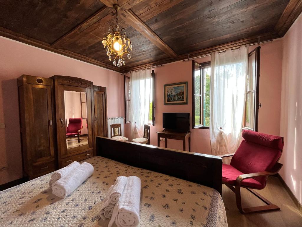 Postel nebo postele na pokoji v ubytování Ca' De Franceschi