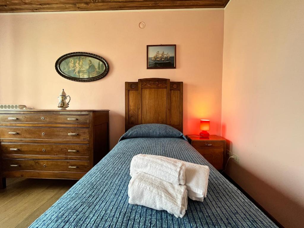 Postel nebo postele na pokoji v ubytování Ca' De Franceschi