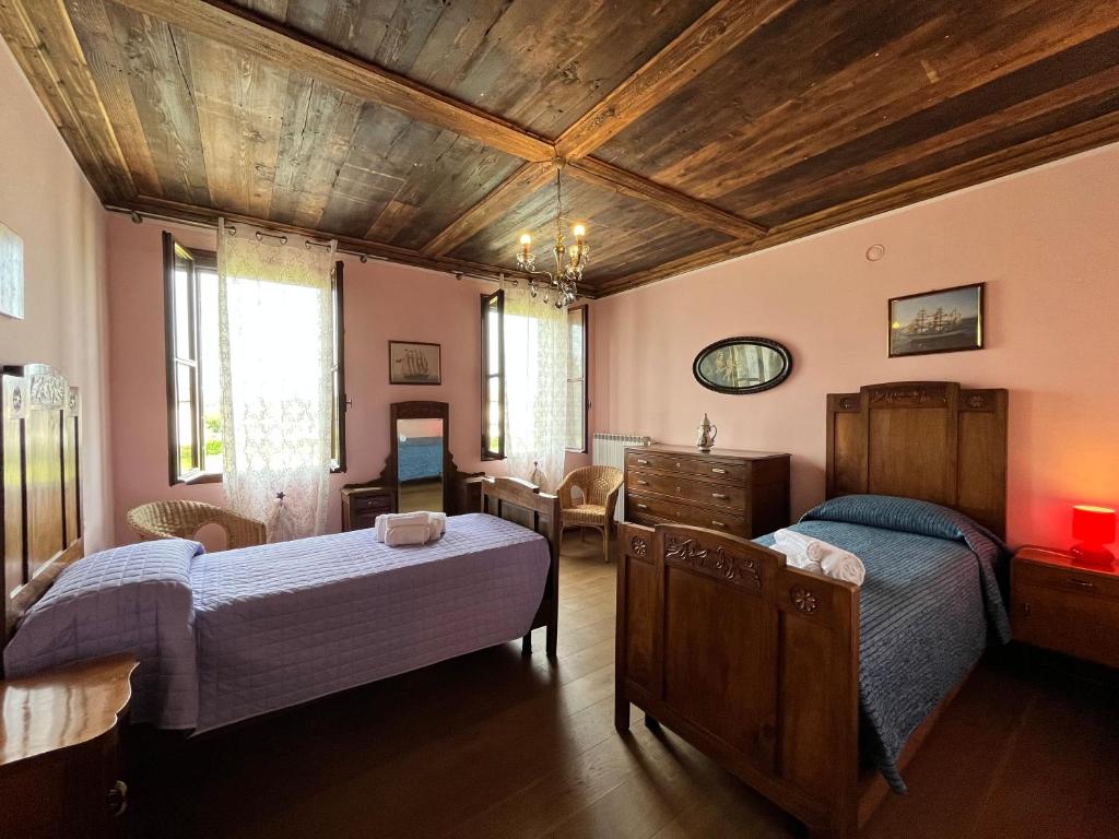 Postel nebo postele na pokoji v ubytování Ca' De Franceschi