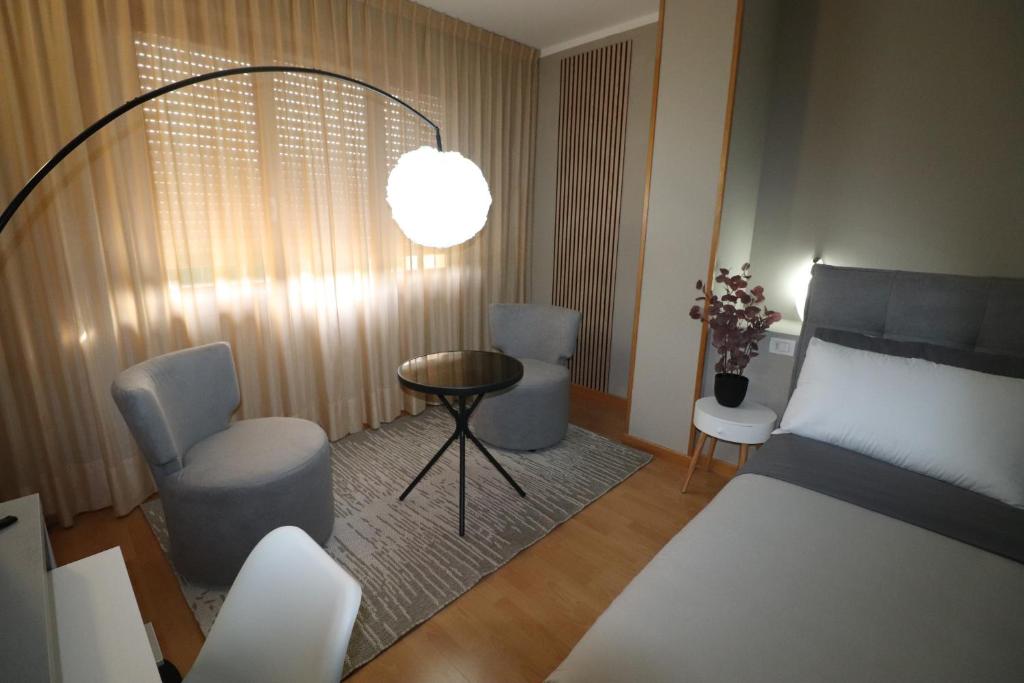 Postel nebo postele na pokoji v ubytování Hotel Rio Umbertide
