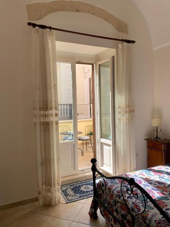 Postel nebo postele na pokoji v ubytování Corcioli B&B