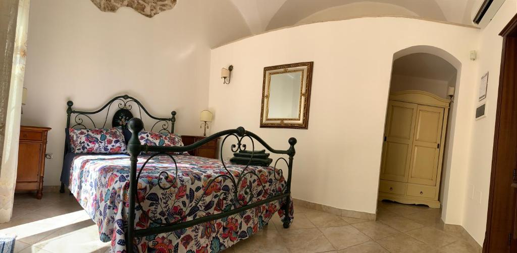 Postel nebo postele na pokoji v ubytování Corcioli B&B