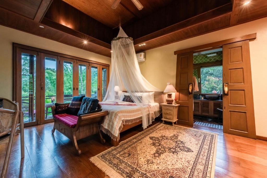Posezení v ubytování Kanlaya's Eyrie, Luxury Homestay