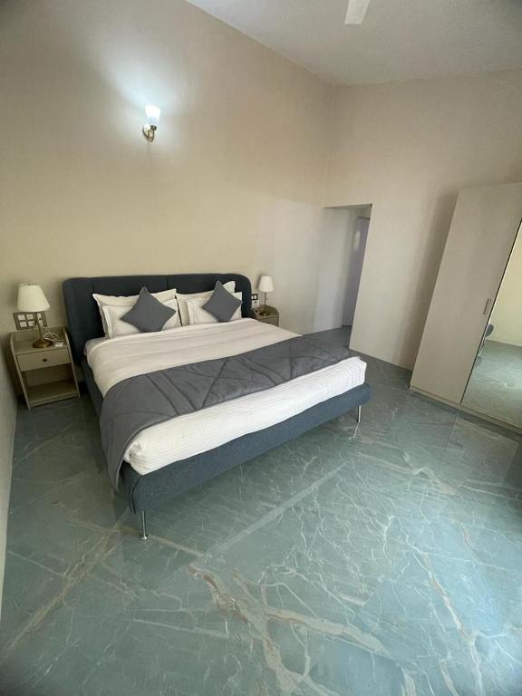 Postel nebo postele na pokoji v ubytování Joets Guesthouse