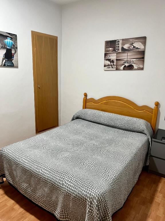 Postel nebo postele na pokoji v ubytování Hospederia del Pilar
