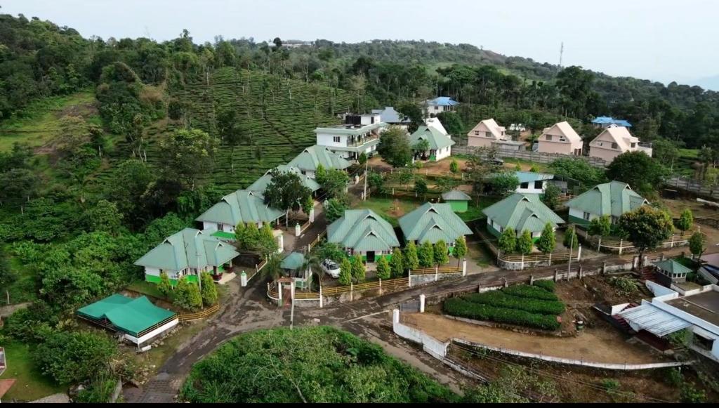 an aerial view of a village on a hill at Moss Adams Inn in Vagamon