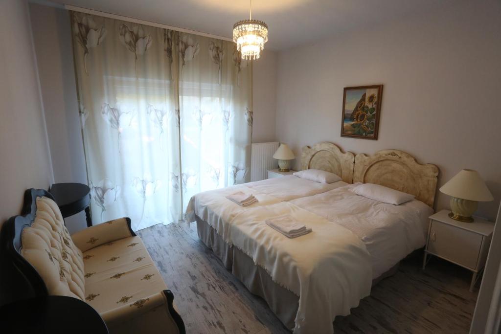 Łóżko lub łóżka w pokoju w obiekcie Pastel Guesthouse