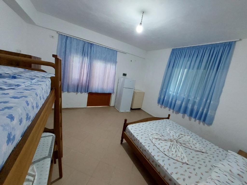 Postel nebo postele na pokoji v ubytování Jungle House