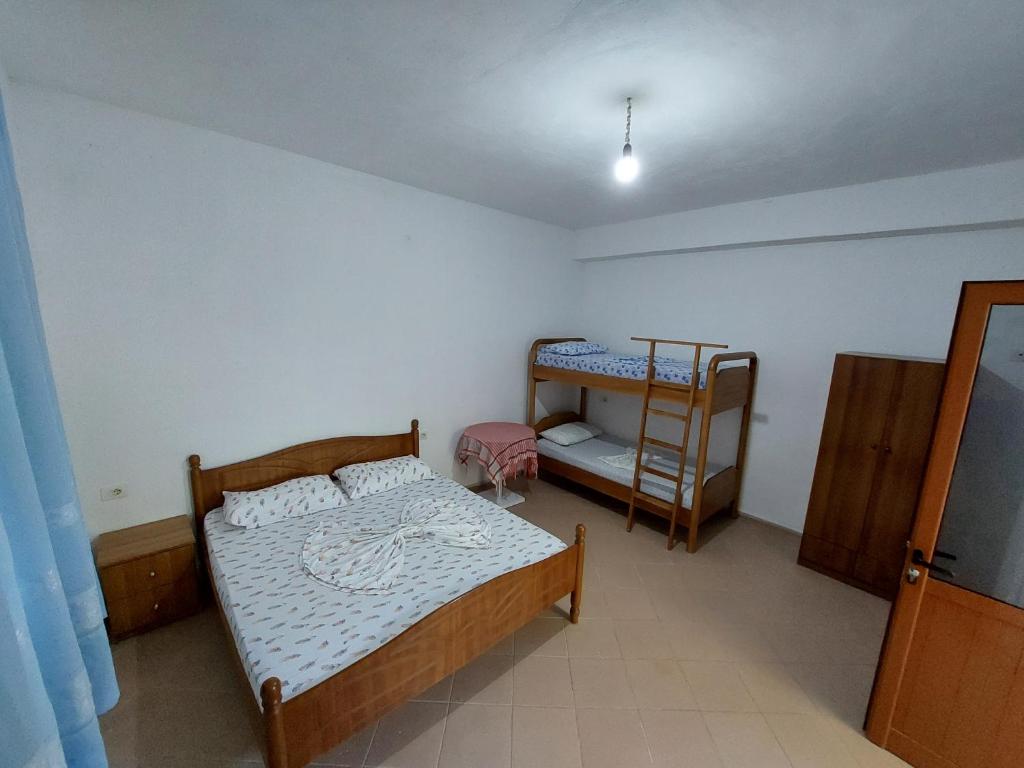 Postel nebo postele na pokoji v ubytování Jungle House