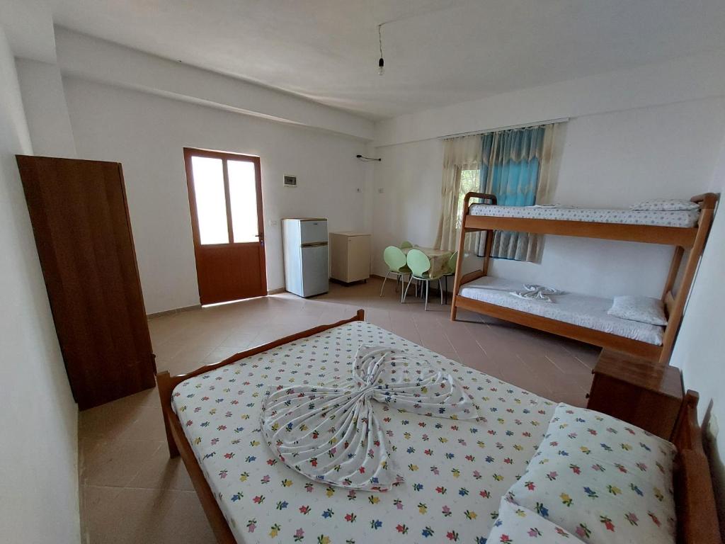 Postel nebo postele na pokoji v ubytování Jungle House