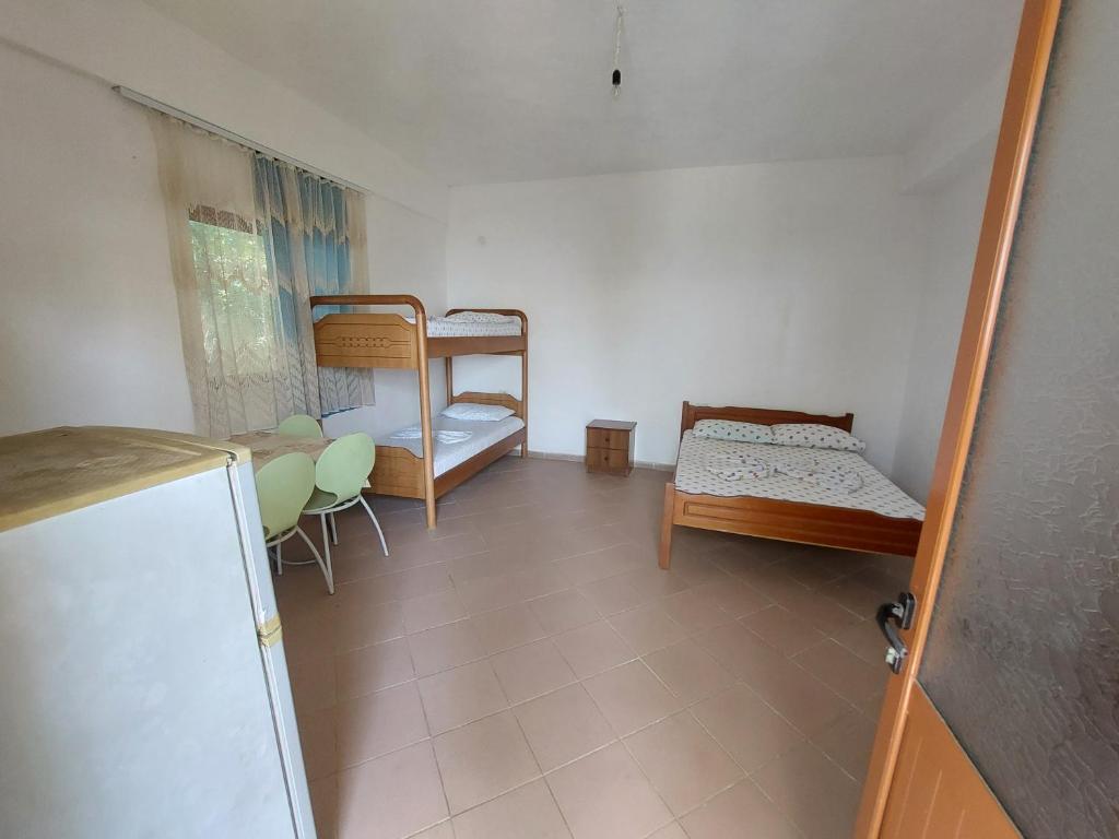 Postel nebo postele na pokoji v ubytování Jungle House