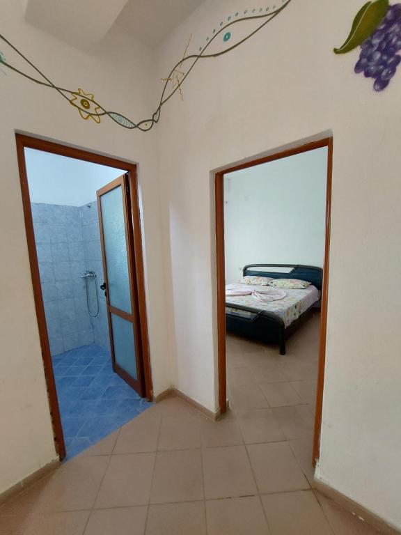 Postel nebo postele na pokoji v ubytování Jungle House