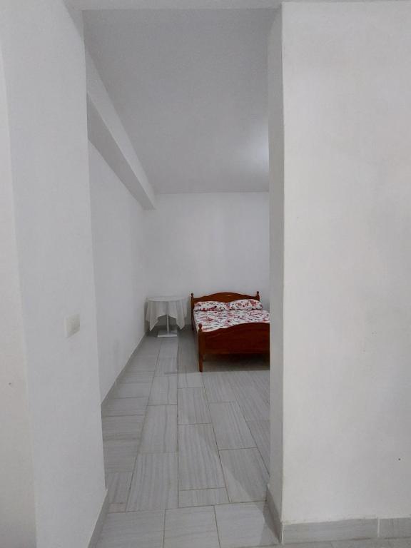 Postel nebo postele na pokoji v ubytování Jungle House