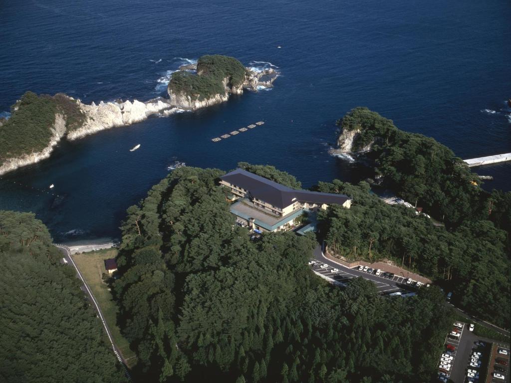 an aerial view of an island in the ocean at Jodogahama Park Hotel in Miyako
