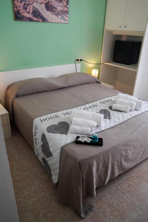 Postel nebo postele na pokoji v ubytování Hotel Cilene