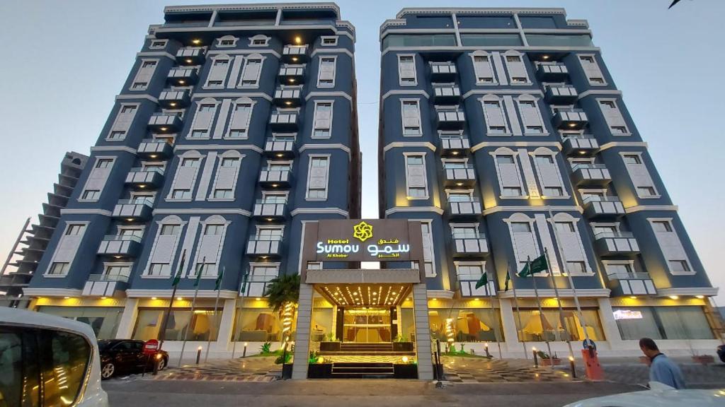 two tall blue buildings next to each other at Sumou Al Khobar Hotel in Al Khobar