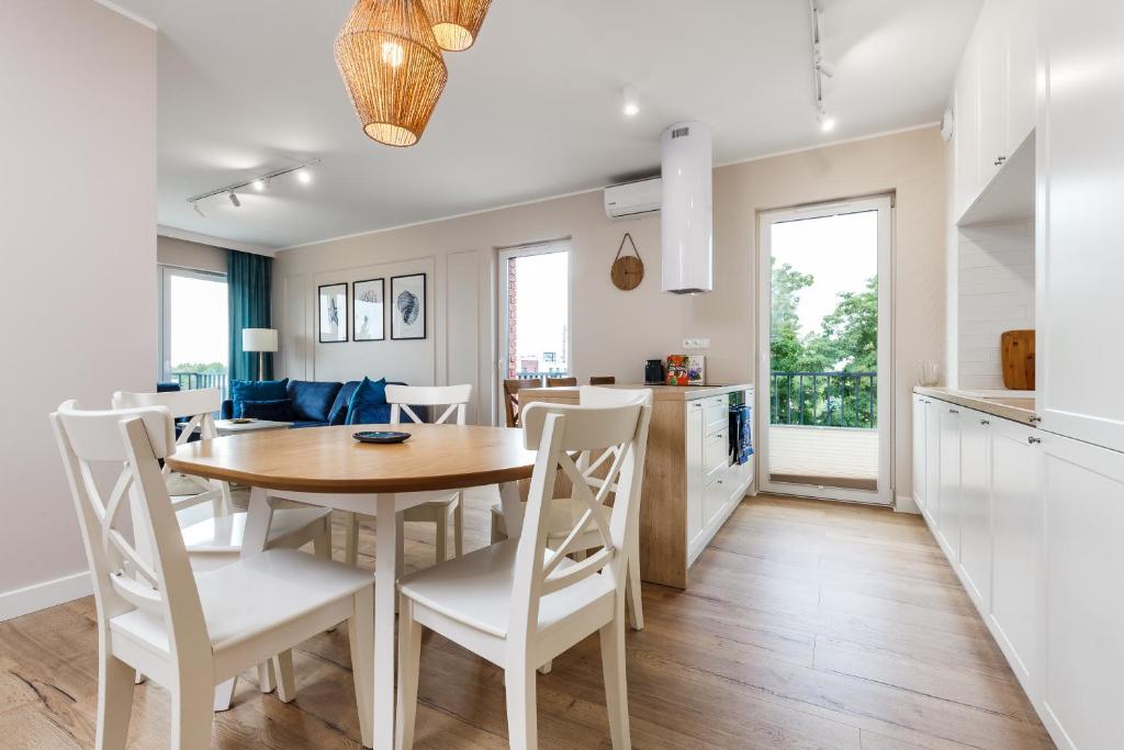 Kuchyň nebo kuchyňský kout v ubytování Apartamenty Family