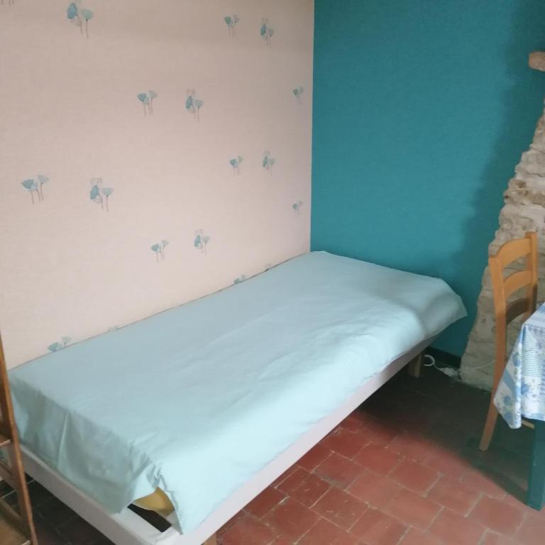 Postel nebo postele na pokoji v ubytování Vallée du Serein