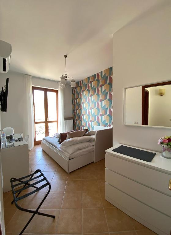 Letto o letti in una camera di Nonna Felicia B&B