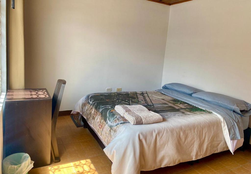 Rúm í herbergi á Casa Bianca