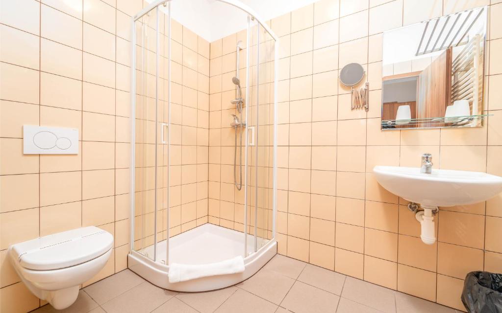 Koupelna v ubytování Hotel Aréna