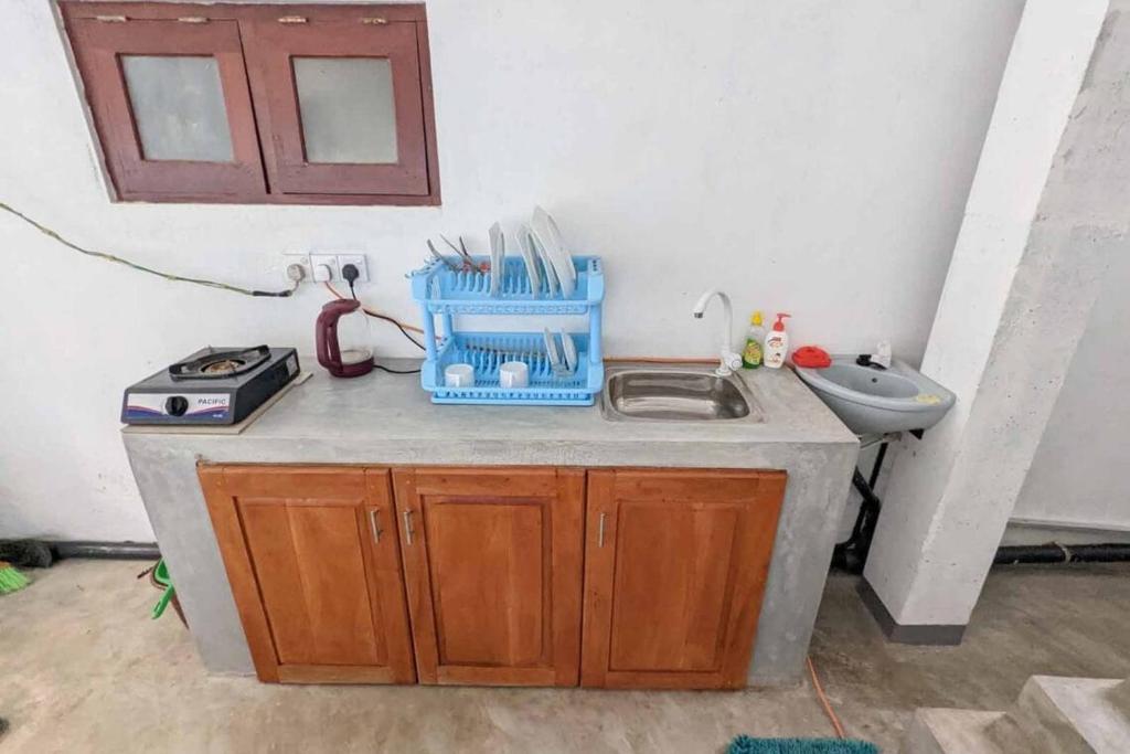 Kuchyň nebo kuchyňský kout v ubytování Villa Wismar Hikkaduwa