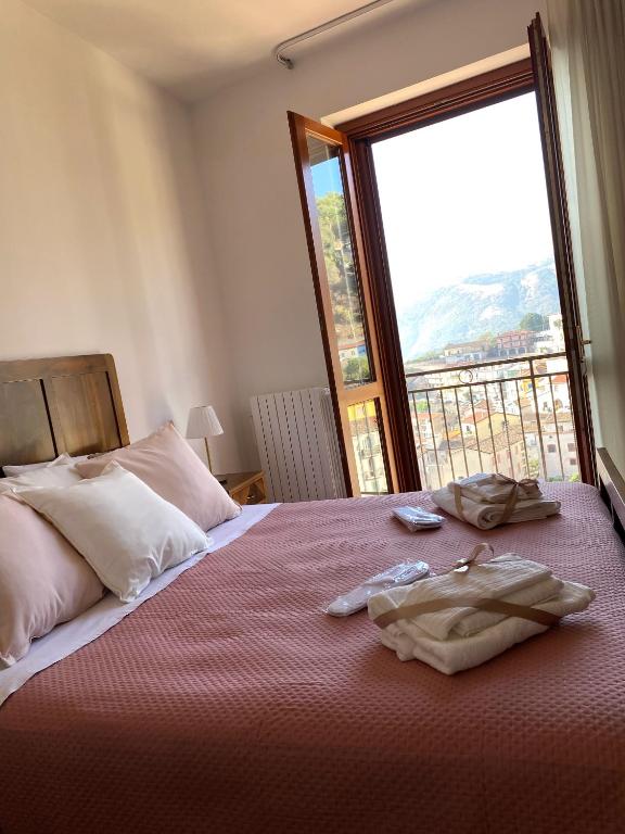 Letto o letti in una camera di Nonna Felicia B&B