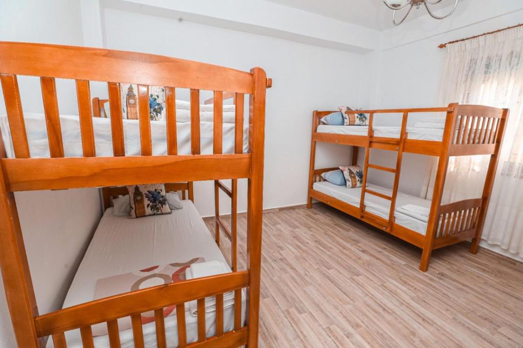 Postel nebo postele na pokoji v ubytování NANA