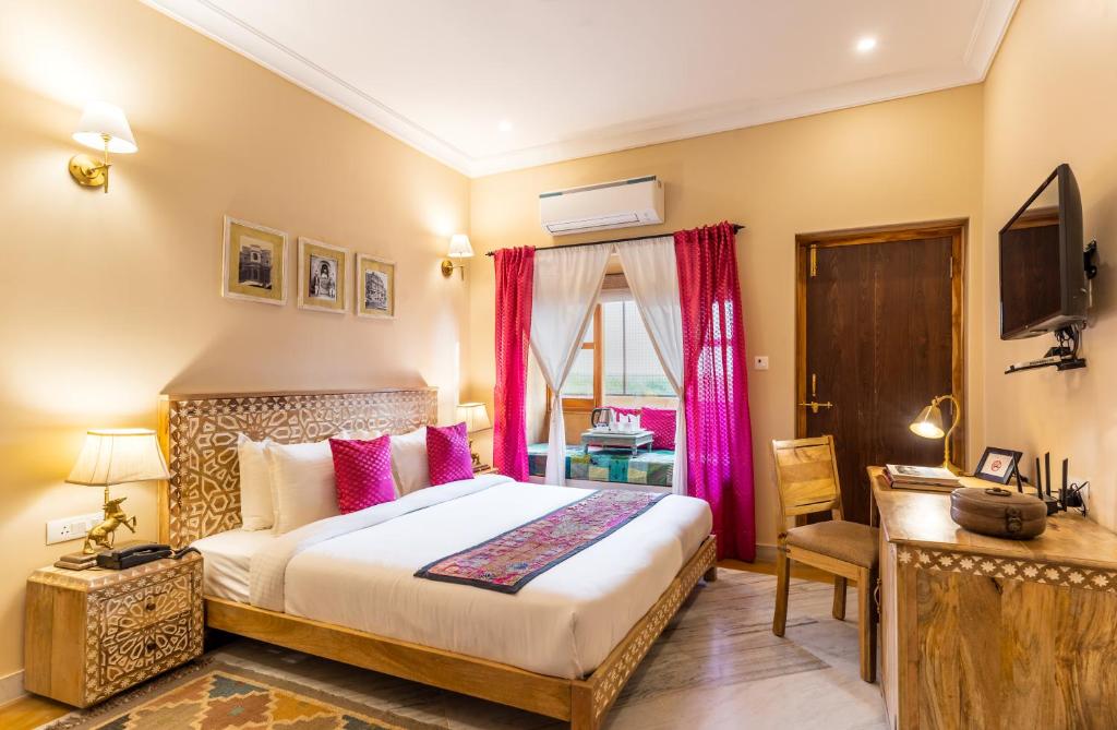 Postel nebo postele na pokoji v ubytování Hotel Jasmin Home