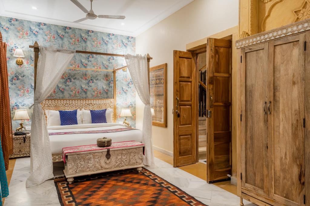 Postel nebo postele na pokoji v ubytování Hotel Jasmin Home
