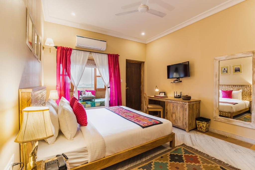 Postel nebo postele na pokoji v ubytování Hotel Jasmin Home