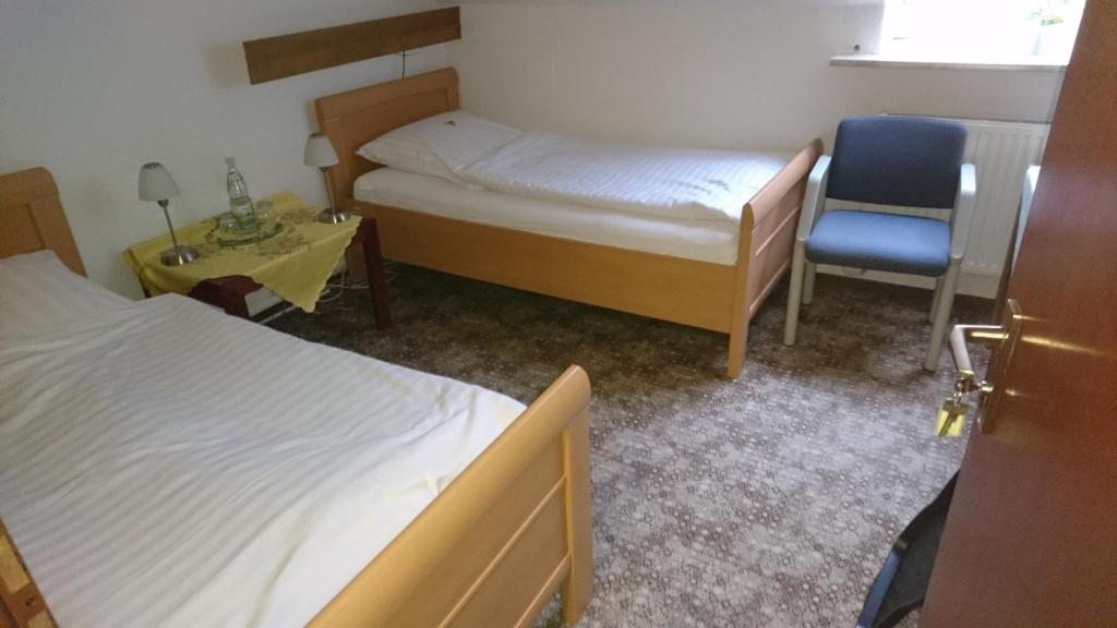 Postel nebo postele na pokoji v ubytování Quellenhof Altenau