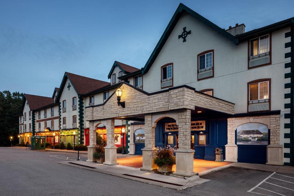 a row of buildings on a street at Irish Cottage Inn & Suites in Galena