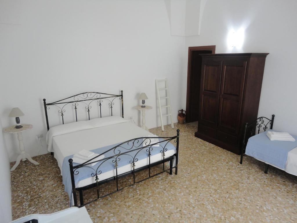 Postel nebo postele na pokoji v ubytování B&B Antiche Stelle Salento
