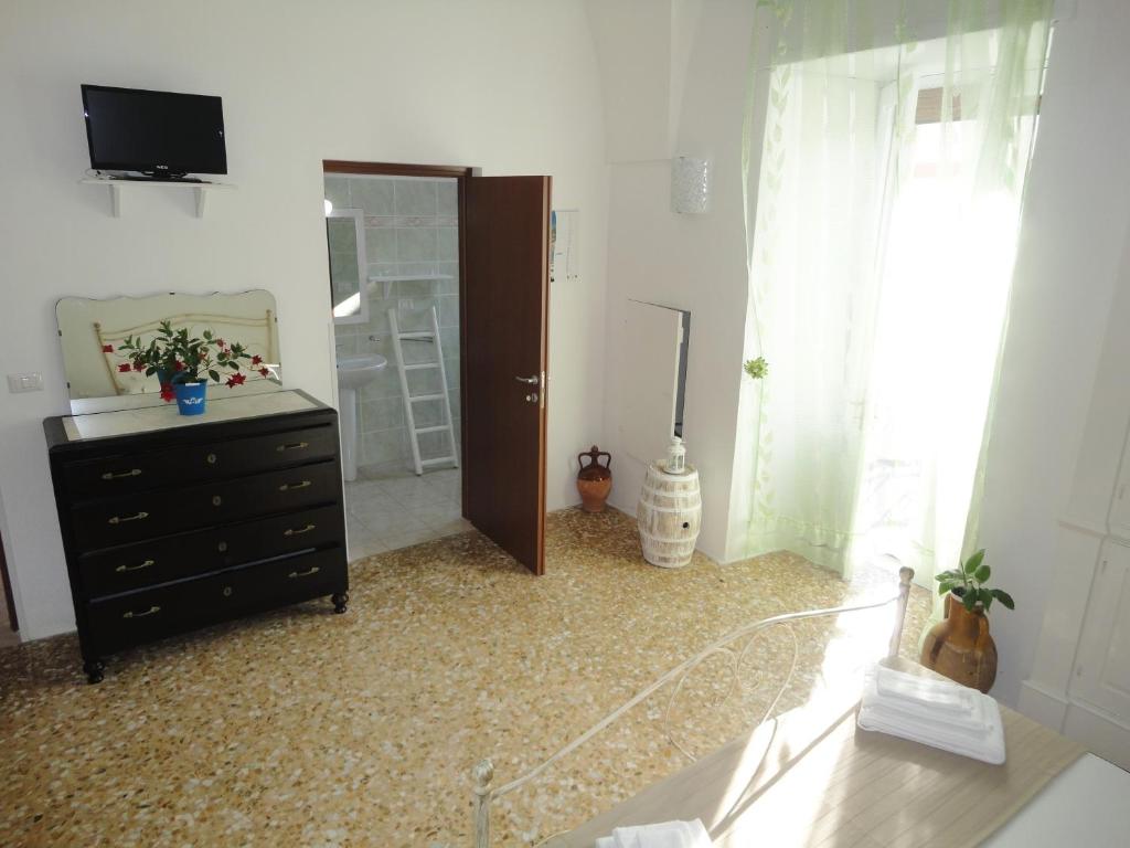 TV a/nebo společenská místnost v ubytování B&B Antiche Stelle Salento