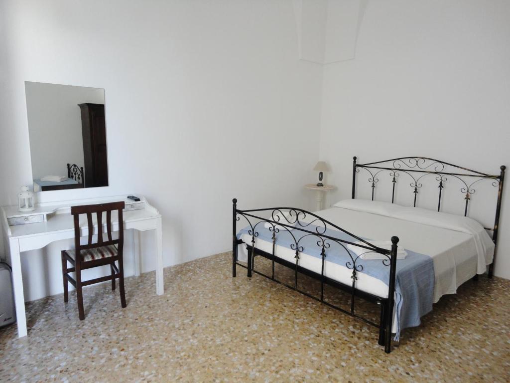 Postel nebo postele na pokoji v ubytování B&B Antiche Stelle Salento