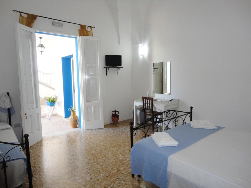 TV a/nebo společenská místnost v ubytování B&B Antiche Stelle Salento