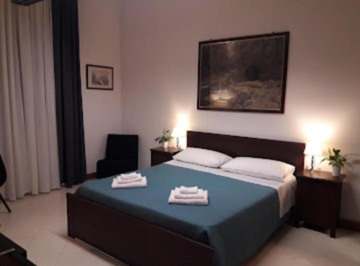 Posteľ alebo postele v izbe v ubytovaní Guest Room Via dei Passeri