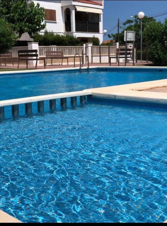 Bazén v ubytovaní Cala puntal alebo v jeho blízkosti