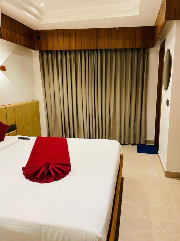 Postel nebo postele na pokoji v ubytování Hotel Emora Tree