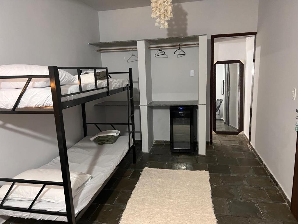 Poschodová posteľ alebo postele v izbe v ubytovaní Casa da Lola
