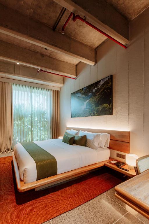 Postel nebo postele na pokoji v ubytování Hotel El Zarzo