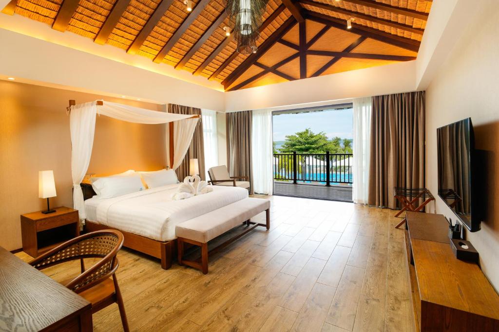 TV a/nebo společenská místnost v ubytování H Resort Bohol - The Coral Cliff by SMS Hospitality