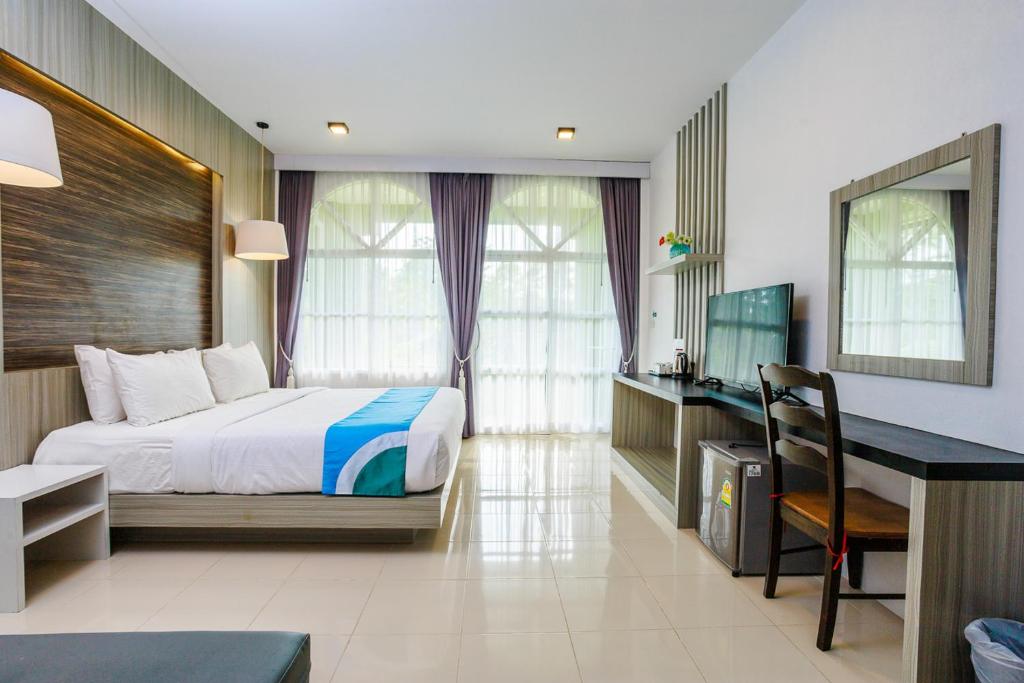 Postel nebo postele na pokoji v ubytování Ao Nang Baan Suan Resort